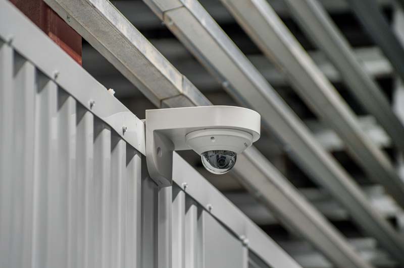 Security camera inside of a storage facility.