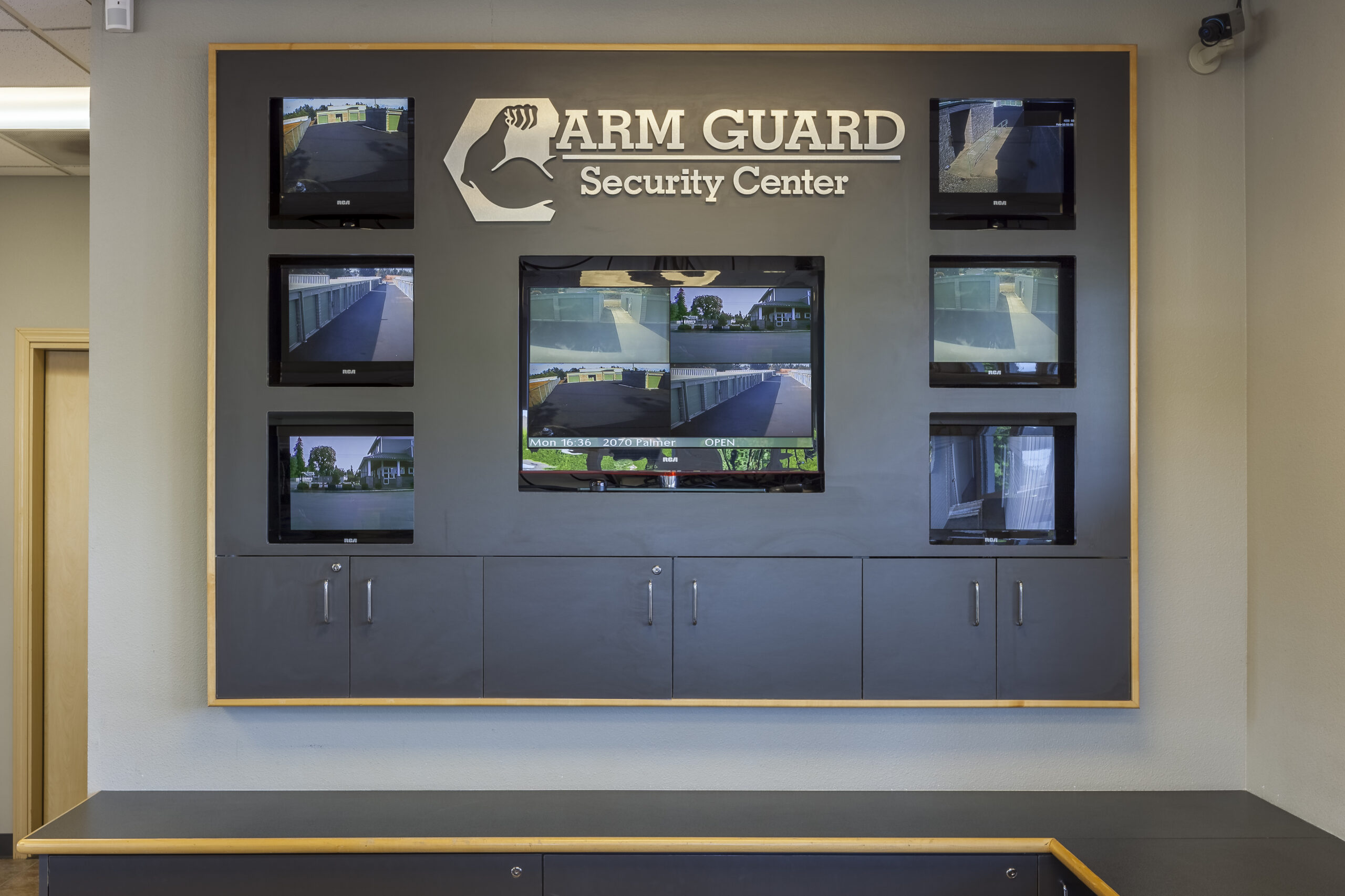 Security footage on display in the front office of a storage facility.