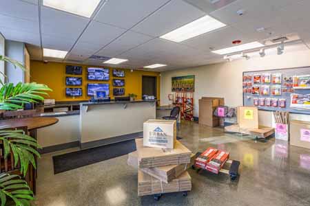 Lobby of a self storage facility's leasing office with packing supplies available for purchase.
