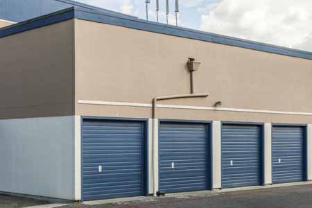 Drive up storage units with a security camera.