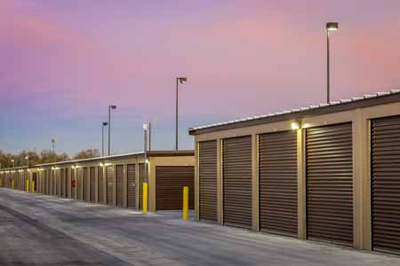 Exterior of large drive up self storage units.