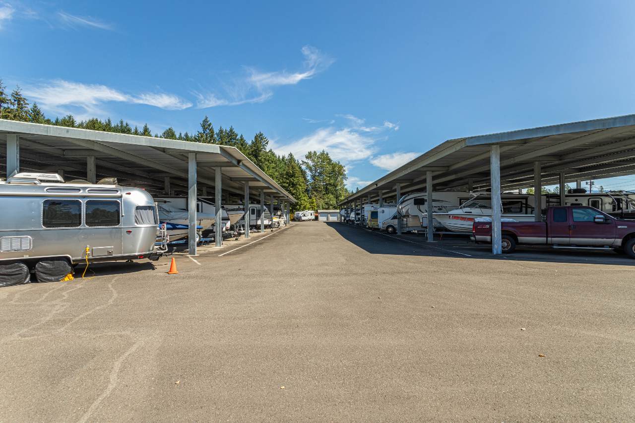 Covered parking for rv and boat storage.
