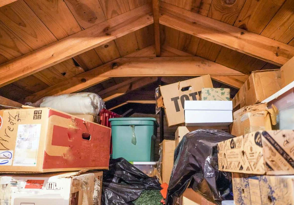 A collection of boxes packed to the roof of a room