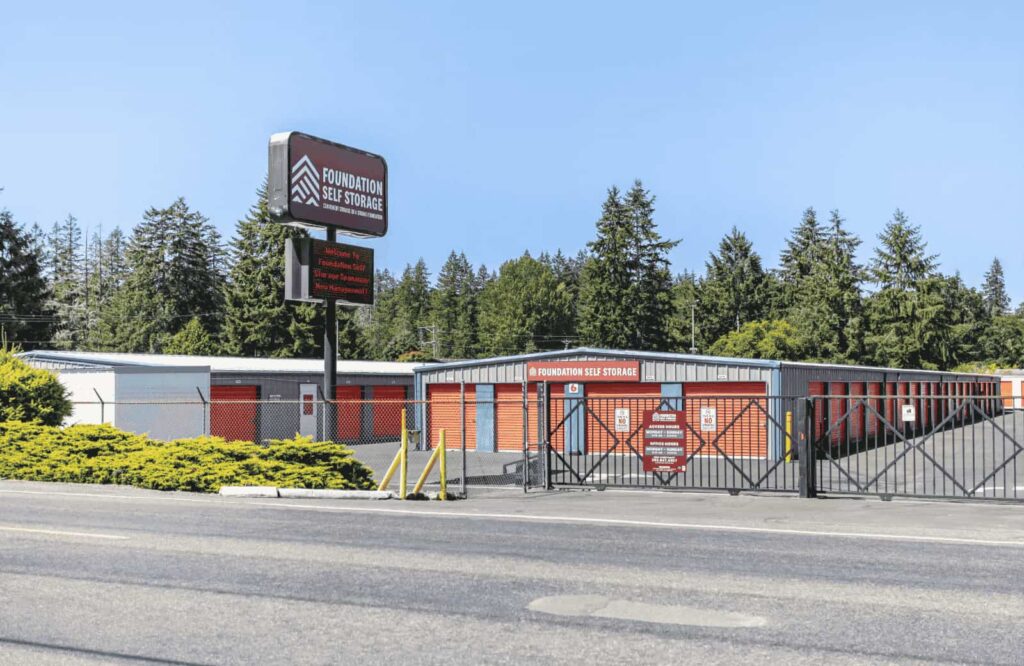 Foundation Self Storage sign and building across road